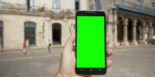 Walking with Green Screen Smartphone in Plaza de la Catedral