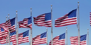 慢镜头华盛顿纪念碑上的美国国旗
