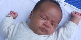 facial expression by baby newborn