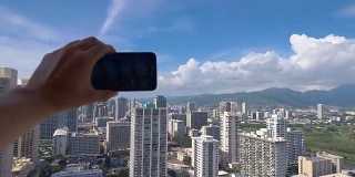 在夏威夷檀香山用4K慢动作拍摄自拍照的观点