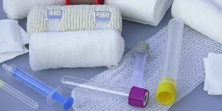 医用绷带与粘贴石膏和注射器为医疗，保健或药房主题