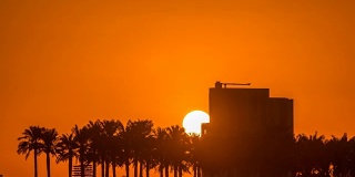 日出从Al Corniche滨水时间在多哈