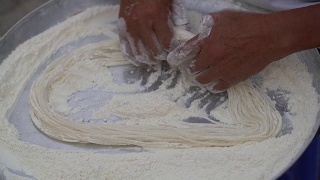 卷须糖，一种由麦芽糖制成的中国传统糖果视频素材模板下载