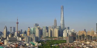 阳光明媚的一天上海城市景观市中心著名的塔湾屋顶全景4k中国