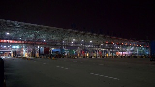 夜光照亮深圳城市交通口岸集装箱码头入口全景4k中国视频素材模板下载