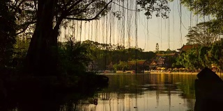 中国日落之光珠海著名的新暖明公园湖全景4k时间