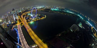 夜间照明新加坡著名酒店屋顶传单湾交通道路全景4k时间推移