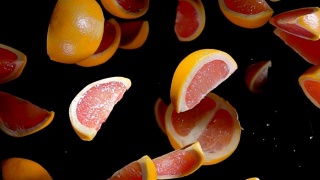 葡萄柚片在镜头前跳跃视频素材模板下载