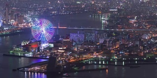 4K延时:大阪湾在美丽的夜晚与游乐园在美丽的日本，缩小