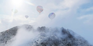 在山顶上穿过云层的气球