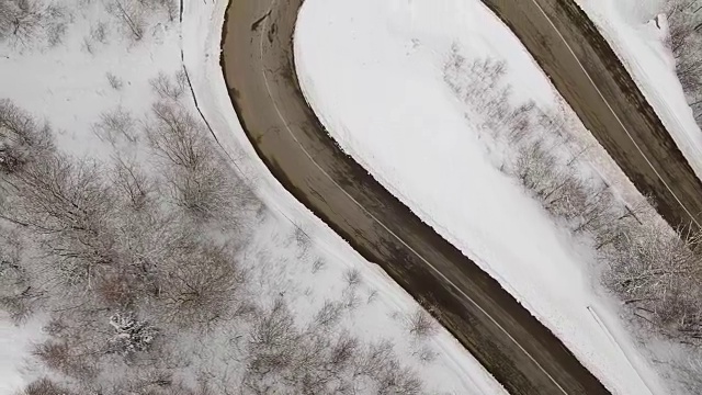 Winter aerial view above the mountain road