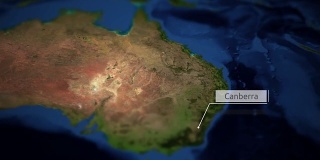 摄像机在堪培拉指示牌上摇摄澳大利亚地图