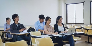 一群亚洲学生正在课堂上学习，学习和教育理念