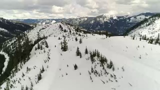 Backcountry Wilderness Mountains Snowmobile Aerial视频素材模板下载
