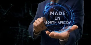 商人在手上展示南非制造的全息概念图