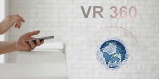 手启动地球的全息图和VR 360文本