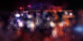城市:雨滴背后的散焦灯光