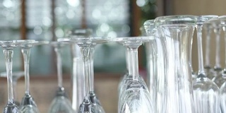 Panning shot of Close up group of glass on counter bar at restaurant