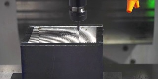 The CNC milling machine cutting the small insert by ball endmill tool.