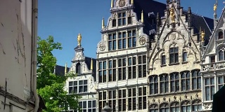 Antwerp, Belgium: Tourists visit The Grand Place, Grote Markt, with the Statue of Brabo,