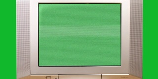 在绿色背景下使用色度键接收干扰的电视