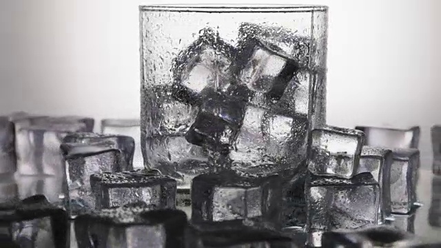 Ice cubes for drinks in a glass of water