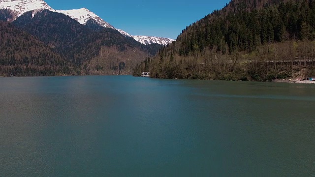 Aerial view on picturesque river and huge mountain in sunny day