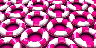 粉红色的游泳环在粉红色的背景