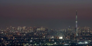 东京，日本，延时-东京新宿金融区和天空树塔从白天到夜晚