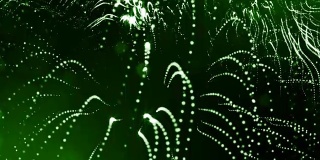 发光粒子的3d渲染循环动画形成摆动线作为摆动的花环作为节日背景或抽象背景的粒子与景深和散景像vj循环。绿色2
