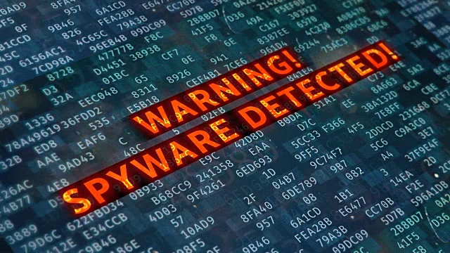 屏幕上显示红色警告信息，检测到间谍软件，黑客企图