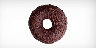 抽象旋转动画的巧克力甜甜圈在白色的背景。
