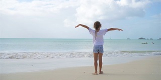 Adorable little girl on the beach on caribbean island