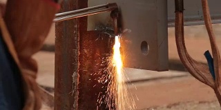 metal cutting worker steel fire