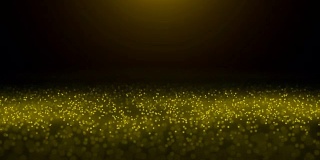黄色粒子在模糊的背景上以慢动作闪烁。照明山1 Zf2Y