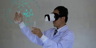 未来医疗技术。医生使用眼镜现实与AR技术的化学配方分析。