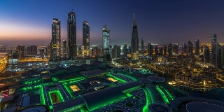 迪拜市中心从黑夜到白天的时间流逝。从上面俯视