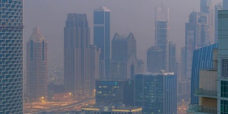 Foggy morning in downtown of Dubai night to day timelapse