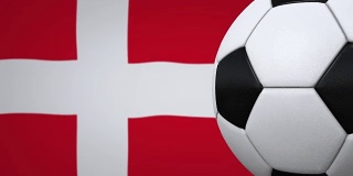 足球循环与丹麦国旗的背景
