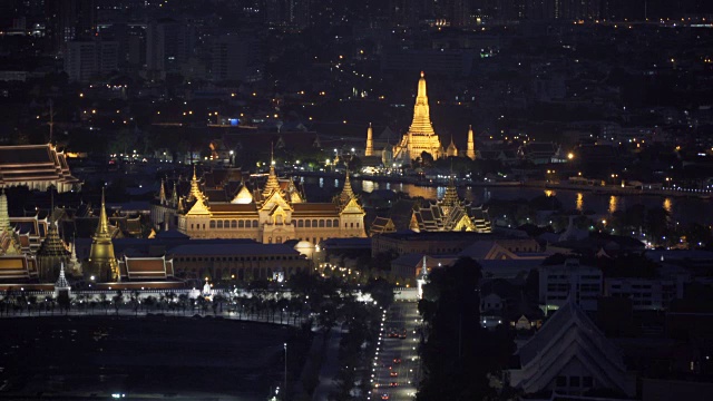 大皇宫，黎明寺和卧佛寺在曼谷市的夜晚，泰国。4K城市景观VDO