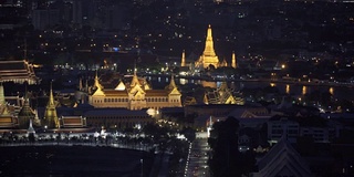 大皇宫，黎明寺和卧佛寺在曼谷市的夜晚，泰国。4K城市景观VDO