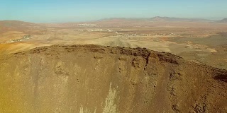 Aerial view of an arid landscape at Caldera de Gairia volcano in Fuerteventura.
