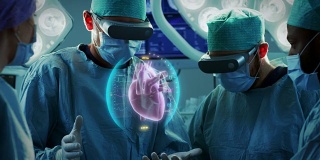 外科医生使用增强现实技术进行心脏手术。使用3D动画和手势进行心脏移植手术。互动动画显示生命体征。未来的医院。