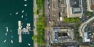 日光苏黎世城著名的湖湾向下观看空中全景，4k时间流逝瑞士