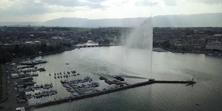 瑞士白天时间日内瓦湖湾著名码头喷泉城市景观航拍全景4k