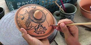 近手装饰陶瓷青瓷，素可泰泰艺术，制作泰国陶瓷工艺品