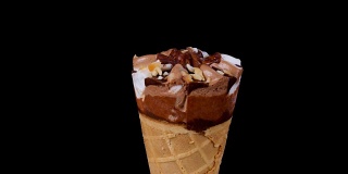 巧克力和香草冰淇淋旋转在黑色的背景