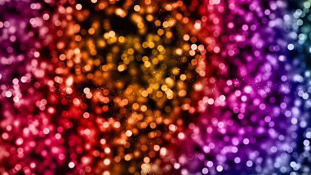 圣诞数码闪烁多色颗粒散景在缤纷背景上流动，节日圣诞喜庆新年快乐