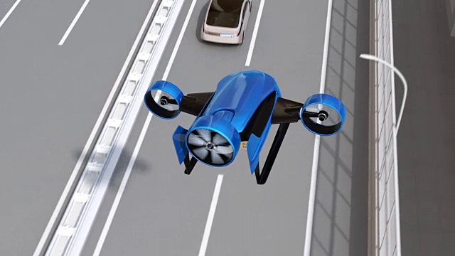 蓝色垂直起降无人机飞越高速公路递送包裹
