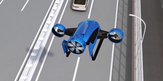 蓝色垂直起降无人机飞越高速公路递送包裹
